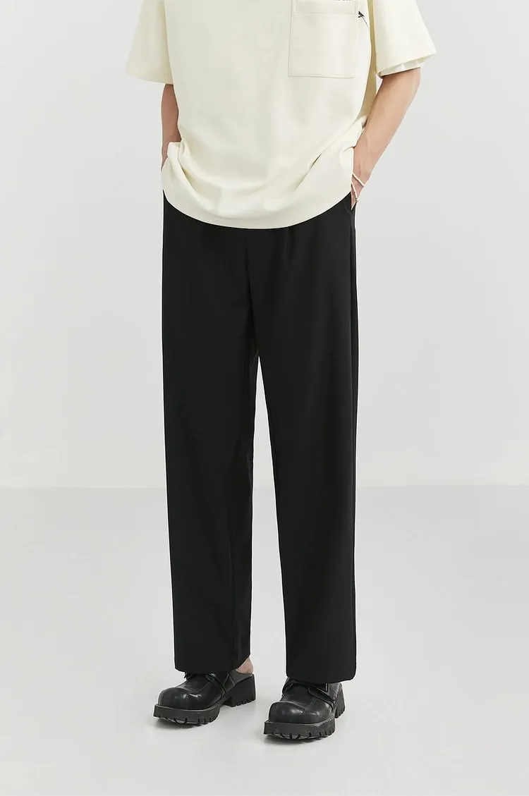 Classic Pleated Trousers with Wide-Leg Cut