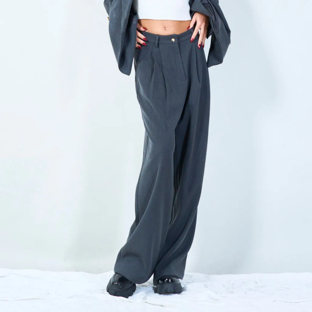 High-waist pleated trousers with decorative button wholesale